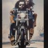 Untitled (man and woman on motorcycle)