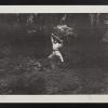 untitled (child doing martial arts in a forest)