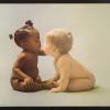 untitled (African American and Caucasian babies kissing)