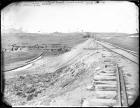 Great Embankment, Granite Canyon, Looking West, Huts of Construction in the Valley