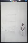untitled (Child sitting in a white room)