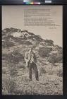 untitled (man standing on rocky hill)