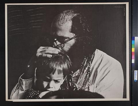 Untitled (man kissing child's head)