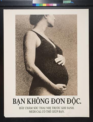 untitled (pregnant woman holding her baby bump)