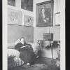 untitled (Gertrude Stein sitting on a couch with art on the wall behind her)